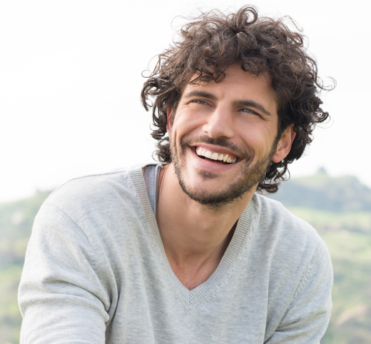 Portrait Of Happy Laughing Man Men’s Services in Greenville, SC